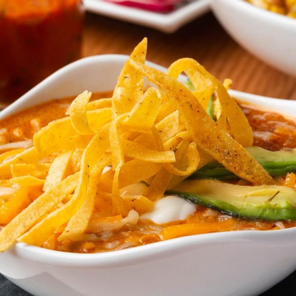 Mezcal Mexican Bar & Kitchen's tortilla soup with avocado, sour cream, and tortilla strips.
